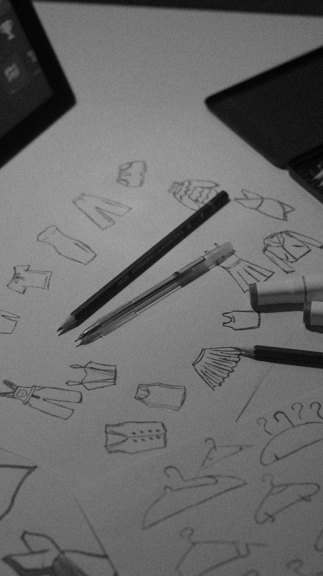 Designer desk with vintage product packaging and sketches