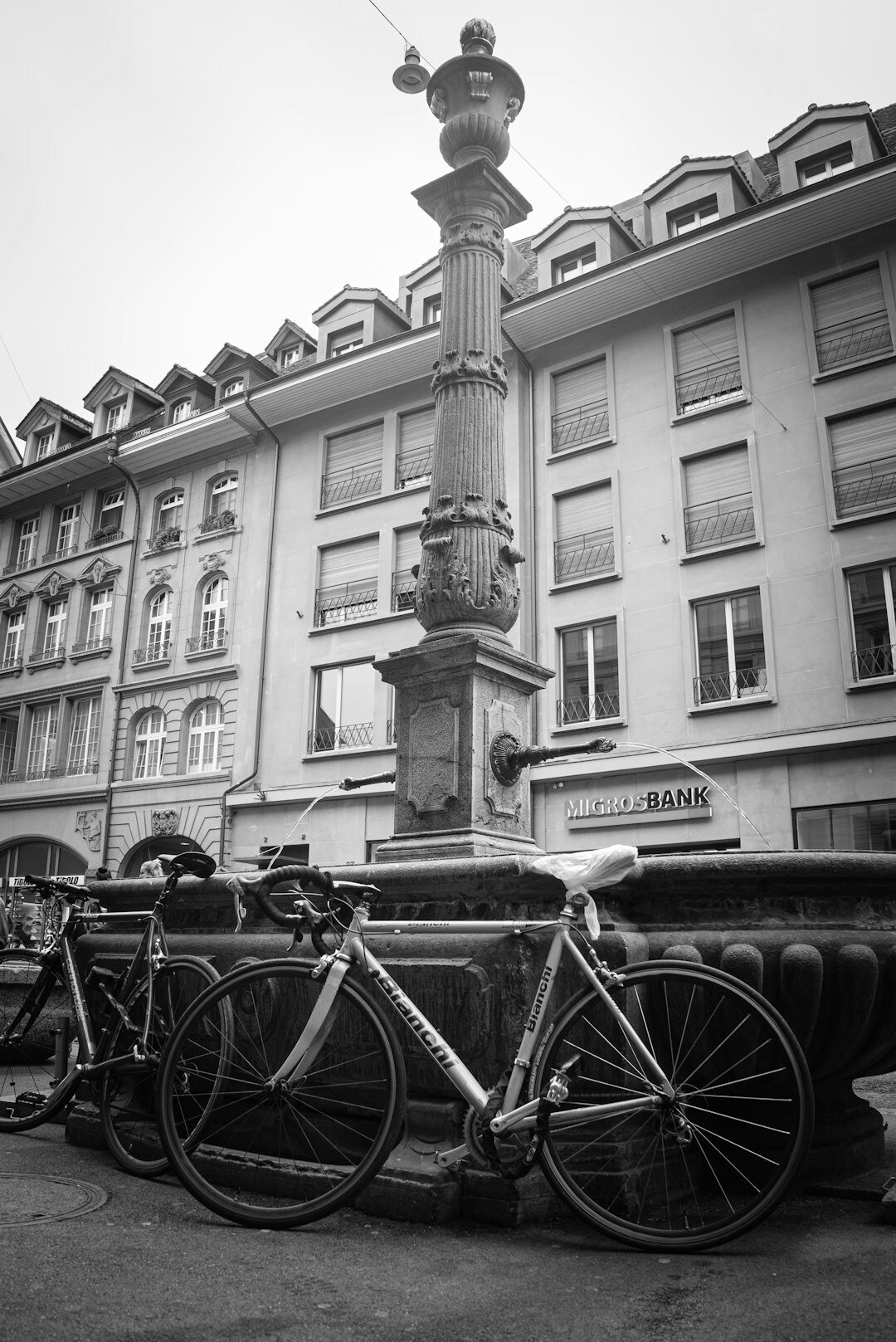Advertising poster column on a Swiss city street